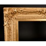 19th Century English School. A Gilt Composition Frame, with swept centres and corners, rebate 42"