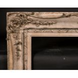 19th Century English School. A Gilt and Painted Composition Frame, with swept centres and corners,