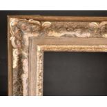 Late 19th Century English School. A Gilt and Painted Composition Frame, with swept centres and