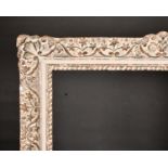 Late 19th Century English School. A Gilt and Painted Composition Frame, with swept centre and