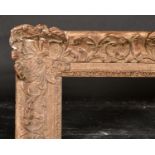 19th Century French School. A Louis Style Gilt Composition Frame, with swept centres and corners,