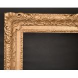 20th Century English School. A Gilt Composition Frame, with swept and pierced centres and corners,