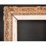 19th Century French School. A Carved Giltwood and Painted Frame, with a white slip, rebate 25.75"