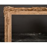 20th Century English School. A Gilt Composition Frame, with swept and pierced centres and corners,