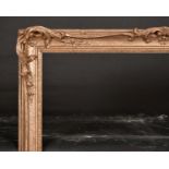 20th Century English School. A Gilt Composition Frame, with Swept and Pierced Centres and Corners,