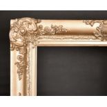 19th Century English School. A Gilt Composition Frame, with swept centres and corners, rebate 24"