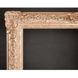 20th Century English School. A Painted Composition Frame, with swept centres and corners, rebate 25"