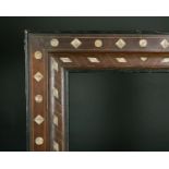 19th Century European School. A Wooden Frame, inlaid with decorated bone, rebate 28" x 18.25" (71.