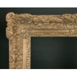 20th Century English School. A Gilt Composition Louis Style Frame, with swept centres and corners,