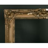 19th Century European School. A Gilt Composition Frame, with swept and pierced centres and
