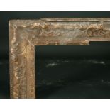 18th Century English School. A Carved Giltwood Frame, with swept centres and corners, rebate 36" x