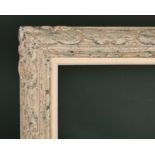 19th Century French School. A Painted Carved Giltwood Frame, with a white slip, rebate 32" x 25.