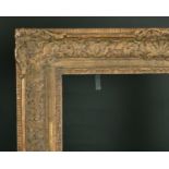 20th Century English School. A Gilt Composition Louis Style Frame, with swept centres and corners,