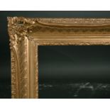 20th Century European School. A Gilt Composition Frame, swept and pierced centres and corners,