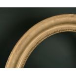 19th Century French School. An Oval Gilt Composition Frame, rebate 32" x 26" (81.3 x 66cm)