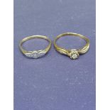 2 9ct gold diamond rings. 2.75 grams..