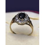 9ct gold diamond and sapphire ring.