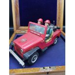 Tin Plate fire dept no1 jeep with two tin plate figures.