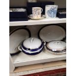 Shelf of Victorian booths wares.