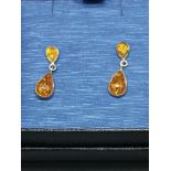 Pair of silver & Amber set earrings.