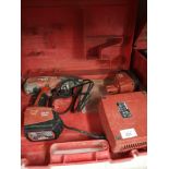 Large boxed hilti drill.