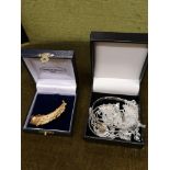 Gold plated leaf brooch together with box of white metal jewellery.