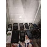 Shelf of mobile phones.