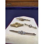 4 yellow metal bar brooches no Hall marks.