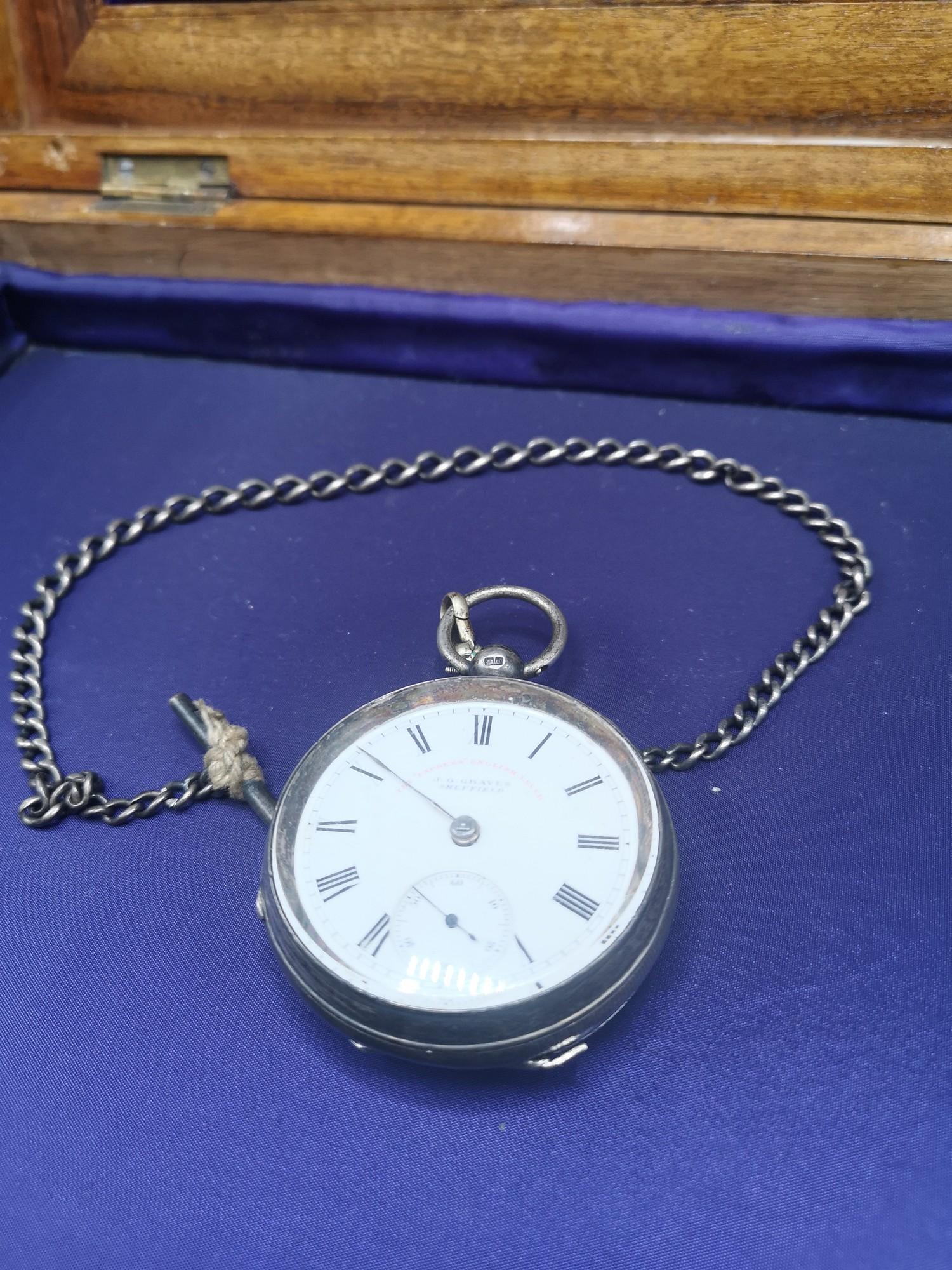 Silver Hall marked pocket watch with albert chain.