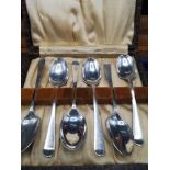 Set of 6 silver Hall marked sheffield spoons in fitted case. 68 grams..