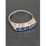 Silver ring set in stunning blue stones.