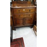 Solid Oak 2 Drawer Over 2 Door Tall Boy Dresser With Caster Feet And Carved Design.