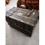 Large 1900s captain s trunk with wooden bounding.