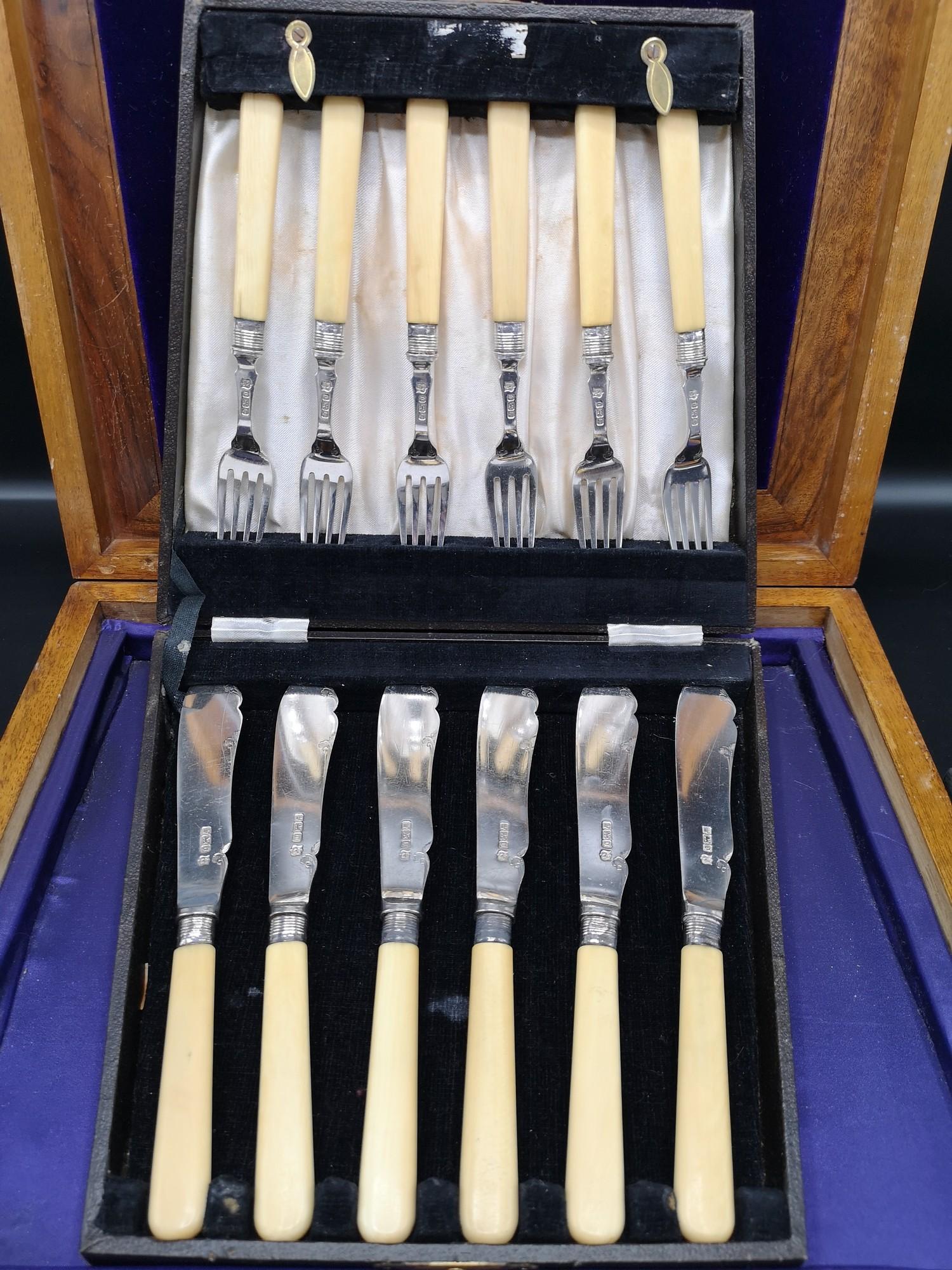 Silver Hall marked sheffield bladed and collard forks and knifes with ivory handles. Maker CB&S.