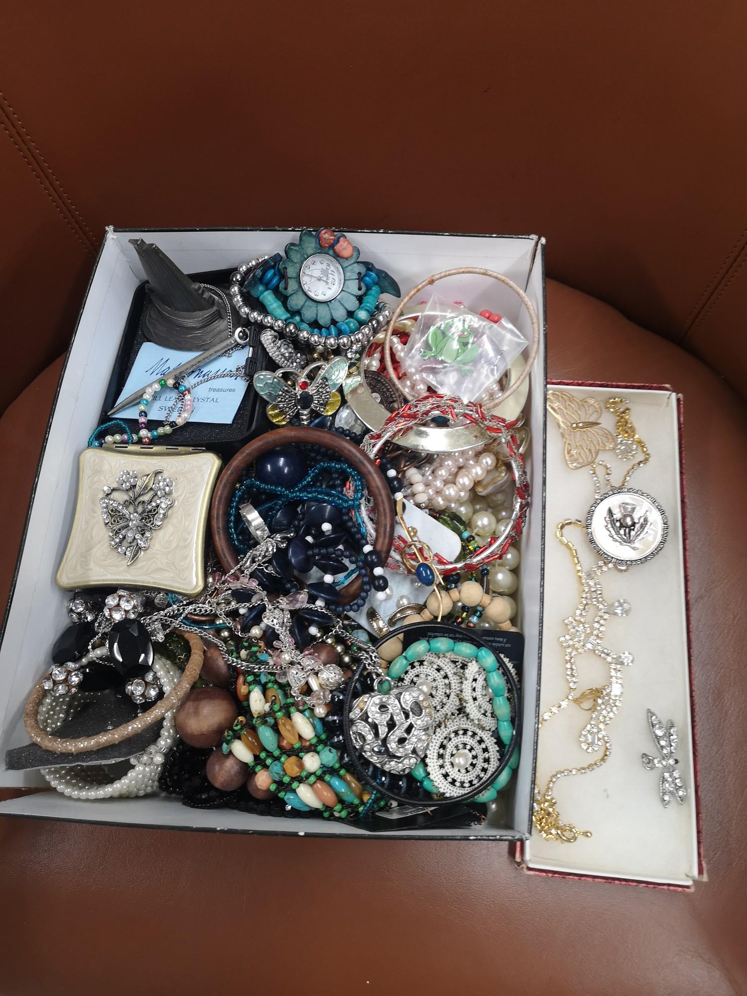 Box of costume Jewellery.