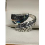 Silver leaf ring set in opal style setting.
