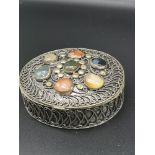 White metal pill box with stone insert.