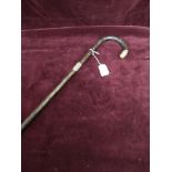 Large carved walking stick With white metal collard..