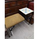 Retro 1970s telephone table with tile effect.