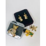 Bear collection of USA designer brooch, and earrings.