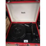 Itek turntable in fitted case.