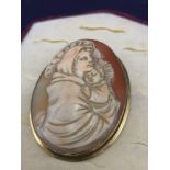 Large yellow metal cameo brooch marked 18k. 15.5 grams.