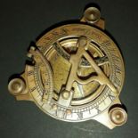 Brass compass / sun dial.