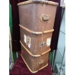 Large wooden bound travel trunk.