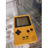 Yellow game boy pocket.