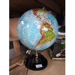 Modern globe. Needs attention.