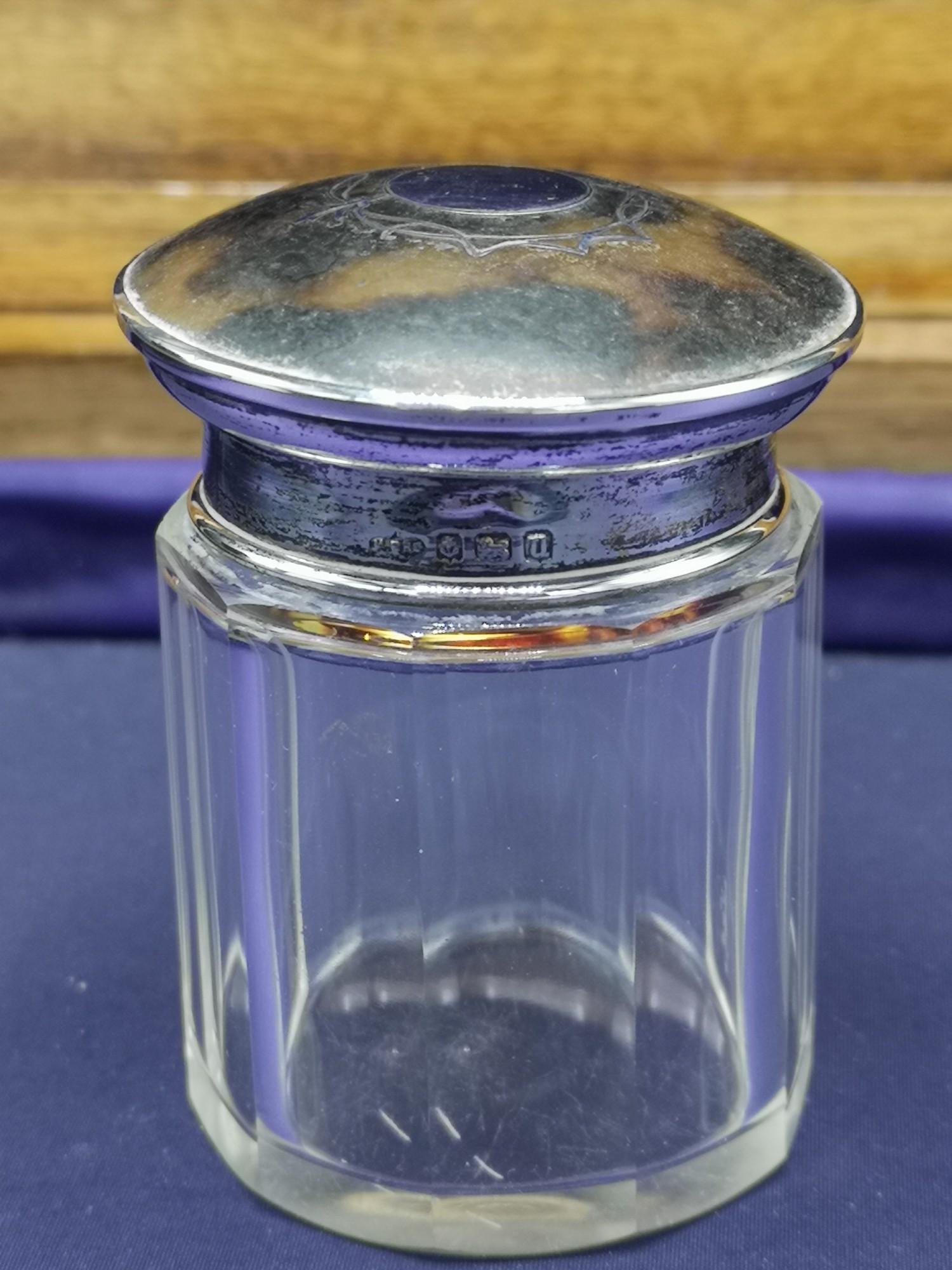 Silver Hall marked birmingham and tortoise shell perfume jar with glass base.