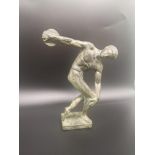 Heavy cast Olympic man figure stands 7 inches km height.