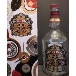 Limited edition chivas regal watch collector box with empty bottle.