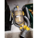 Dyson yellow cylinder hoover.